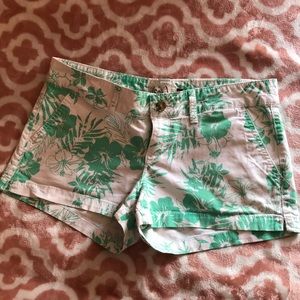 Green floral print shorts